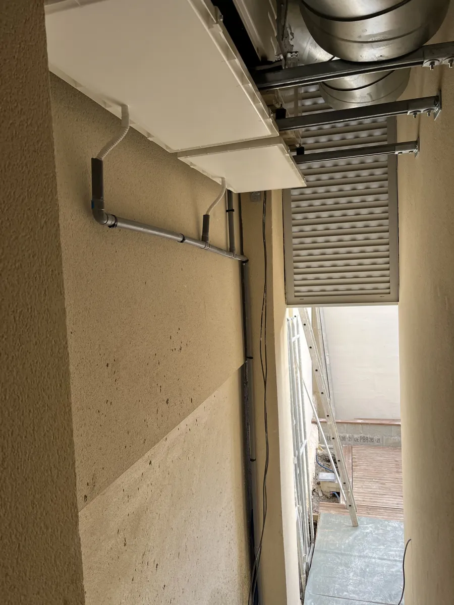 Grille en façade pour préserver l'aspect de la maison